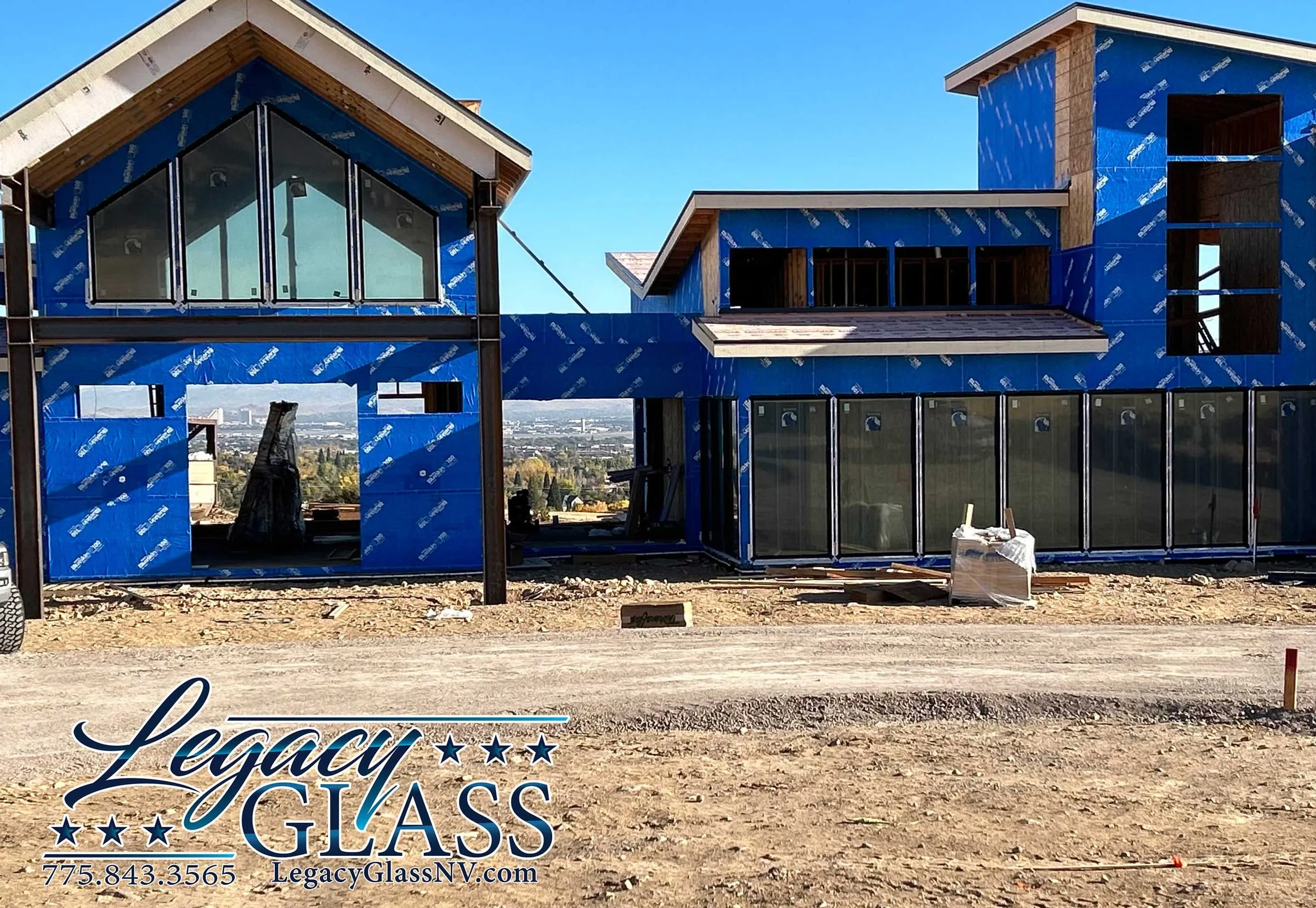 New construction home with large windows overlooking Reno